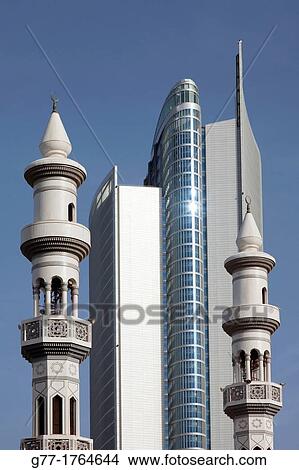United Arab Emirates Abu Dhabi. Muslim mosque among modern skyscrapers. View Large Photo Image Picture - United Arab Emirates Abu Dhabi. Muslim mosque among modern skyscrapers.. Fotosearch