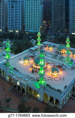 United Arab Emirates Abu Dhabi. Muslim mosque among modern skyscrapers. View Large Photo Image Stock Image - United Arab Emirates Abu Dhabi. Muslim mosque among modern skyscrapers.. Fotosearch