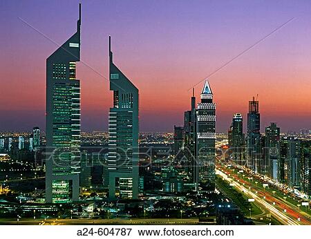Stock Photo - United Arab Emirates. Dubai City. Sheikh Zayed Road. Emirates Towers. Fotosearch