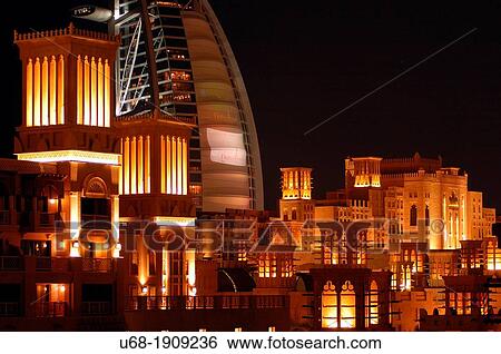 United Arab Emirates, Dubai. In the luxurious complex of Madinat Jumeirah situated on the Persian Gulf, there is the luxury hotel called Burj al Arab. View Large Photo Image Stock Photograph - United Arab Emirates, Dubai. In the luxurious complex of Madinat Jumeirah situated on the Persian Gulf, there is the luxury hotel called Burj al Arab.. Fotosearch