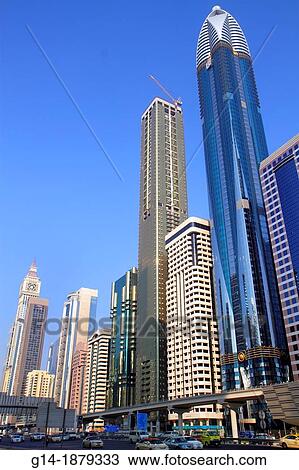 United Arab Emirates, Dubai, Trade Centre, Sheikh Zayed Road, Rose Tower, Rotana, Oasis Tower, skyscraper, Al Ghaya Tower, Ahmed Abdul Rahim Al Attar Tower, Al Yaqoub Tower View Large Photo Image Stock Image - United Arab Emirates, Dubai, Trade Centre, Sheikh Zayed Road, Rose Tower, Rotana, Oasis Tower, skyscraper, Al Ghaya Tower, Ahmed Abdul Rahim Al Attar Tower, Al Yaqoub Tower. Fotosearch