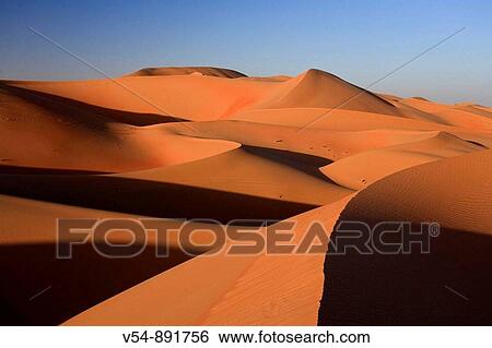 Stock Photograph - United Arab Emirates, Liwa Oasis, Sand dunes near the Empty Quarter Desert. Fotosearch