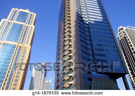 United Arab Emirates, U A E, UAE, Middle East, Dubai, Jumeirah Lake Towers, HDS Tower, Dubai Arch Tower, RS Limited, tall building, skyscraper, residential, condominium, View Large Photo Image Stock Image - United Arab Emirates, U A E, UAE, Middle East, Dubai, Jumeirah Lake Towers, HDS Tower, Dubai Arch Tower, RS Limited, tall building, skyscraper, residential, condominium,. Fotosearch