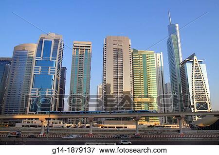 United Arab Emirates, U A E, UAE, Middle East, Dubai, Jumeirah Lake Towers Metro Station, Red Line, Lake City Tower, Global Lake View, Almas Tower, Indigo Tower, tall building, skyscraper, residential, condominium, E11 Sheikh Zayed Road, View Large Photo Image Stock Photo - United Arab Emirates, U A E, UAE, Middle East, Dubai, Jumeirah Lake Towers Metro Station, Red Line, Lake City Tower, Global Lake View, Almas Tower, Indigo Tower, tall building, skyscraper, residential, condominium, E11 Sheikh Zayed Road,. Fotosearch