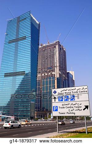 United Arab Emirates, U A E, UAE, Middle East, Dubai, Sheikh Zayed Road, Sama Tower, Duja Tower, under construction, skyscraper, traffic, English, Arabic, language, sign, directions, arrows, World Trade Centre Tower, View Large Photo Image Stock Photo - United Arab Emirates, U A E, UAE, Middle East, Dubai, Sheikh Zayed Road, Sama Tower, Duja Tower, under construction, skyscraper, traffic, English, Arabic, language, sign, directions, arrows, World Trade Centre Tower,. Fotosearch