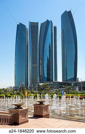 United Arab Emirates UAE, Abu Dhabi City, Etihad Towers in front of the Emirates Palace View Large Photo Image Stock Image - United Arab Emirates UAE, Abu Dhabi City, Etihad Towers in front of the Emirates Palace. Fotosearch