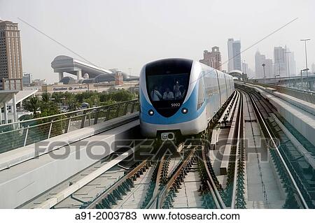 United Arab Emirates (UAE), Dubai, in the sky train (metro) View Large Photo Image Stock Image - United Arab Emirates (UAE), Dubai, in the sky train (metro). Fotosearch