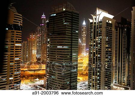 United Arab Emirates (UAE), Dubai, apartments towers at night View Large Photo Image Stock Photograph - United Arab Emirates (UAE), Dubai, apartments towers at night. Fotosearch