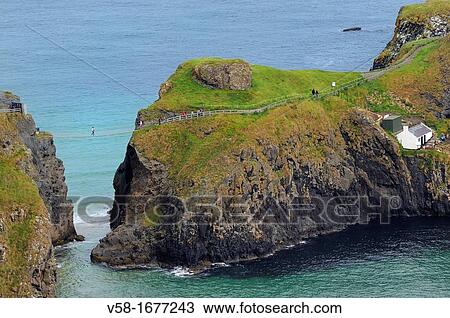 United Kingdom, Northern Ireland, Antrim coast, Carrick-a-rede rope bridge View Large Photo Image Stock Image - United Kingdom, Northern Ireland, Antrim coast, Carrick-a-rede rope bridge. Fotosearch