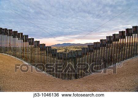 United States border fence, US/Mexico border, east of Nogales, Arizona, USA, looking south from US side of border View Large Photo Image Stock Photograph - United States border fence, US/Mexico border, east of Nogales, Arizona, USA, looking south from US side of border. Fotosearch