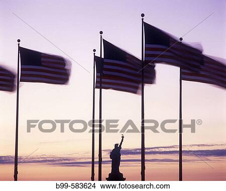 Picture - United states flags & statue of liberty, New York, USA.. Fotosearch