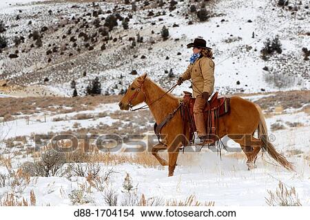 Picture - United States, Wyoming, Shell, The Hideout Guest Ranch, cowgirl. Fotosearch