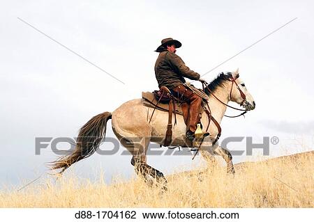Stock Image - United States, Wyoming, Shell, The Hideout Guest Ranch, cow-boy, Boots. Fotosearch