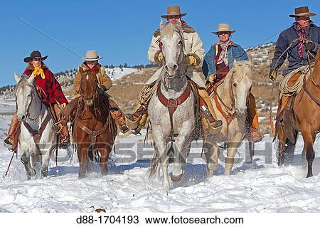 Stock Image - United States, Wyoming, Shell, The Hideout Guest Ranch, cowboys. Fotosearch