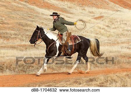 Stock Image - United States, Wyoming, Shell, The Hideout Guest Ranch, cow-boy, Boots. Fotosearch