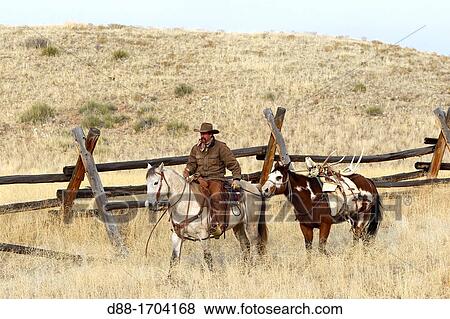Stock Photo - United States, Wyoming, Shell, The Hideout Guest Ranch, cow-boy, Boots. Fotosearch