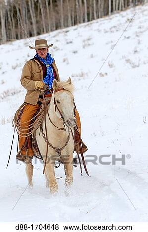 Stock Photo - United States, Wyoming, Shell, The Hideout Guest Ranch, cowgirl. Fotosearch