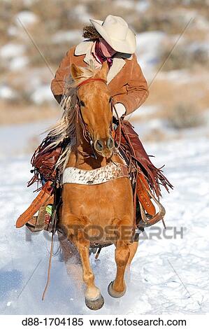Stock Photography - United States, Wyoming, Shell, The Hideout Guest Ranch, cowgirl. Fotosearch