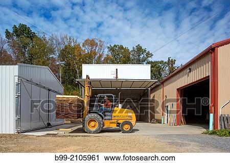 UNLOADING DRYING KILN WINDRIVER WOODWORKS LUMBER YARD JEFFERSON COUNTY PENNSYLVANIA USA. View Large Photo Image Stock Image - UNLOADING DRYING KILN WINDRIVER WOODWORKS LUMBER YARD JEFFERSON COUNTY PENNSYLVANIA USA.. Fotosearch
