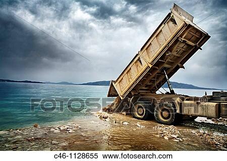 Unloading rubble View Large Photo Image Stock Photography - Unloading rubble. Fotosearch