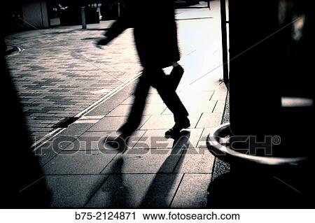 Unrecognizable executive with a portfolio walking in the street in London, England, UK, Europe View Large Photo Image Stock Image - Unrecognizable executive with a portfolio walking in the street in London, England, UK, Europe. Fotosearch