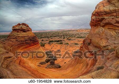 Unusual rock formations formed by erosion of sandstone make up the landscape at South Coyote Buttes at Vermillion Cliffs National Monument, Arizona. View Large Photo Image Stock Photo - Unusual rock formations formed by erosion of sandstone make up the landscape at South Coyote Buttes at Vermillion Cliffs National Monument, Arizona.. Fotosearch