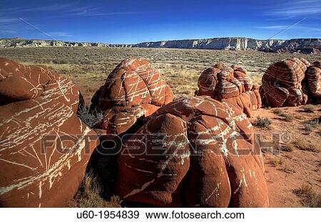 Stock Photo - Unusual sandstone formations are plentiful at Blue Canyon on the Navajo Indian Reservation in Northern Arizona.. Fotosearch