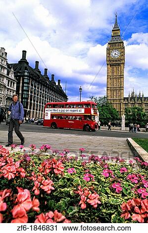Stock Image - unusual view of traffic in front of Big Ben in London England. Fotosearch