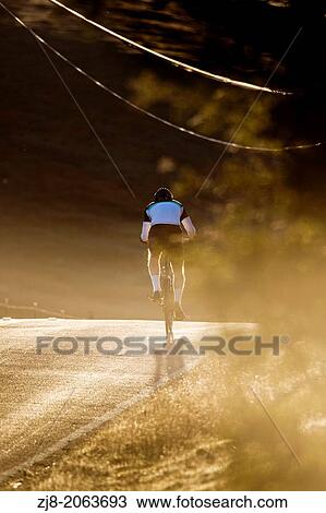 Uphill cycling in early morning, Los Altos Hills, California, USA View Large Photo Image Stock Image - Uphill cycling in early morning, Los Altos Hills, California, USA. Fotosearch