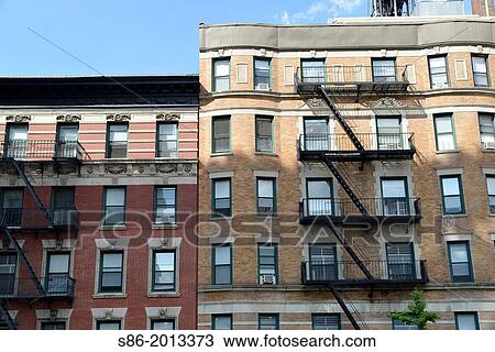 Upper Floors of Two Harlem, New York City, Tenement Apartment Buildings. View Large Photo Image Stock Image - Upper Floors of Two Harlem, New York City, Tenement Apartment Buildings.. Fotosearch