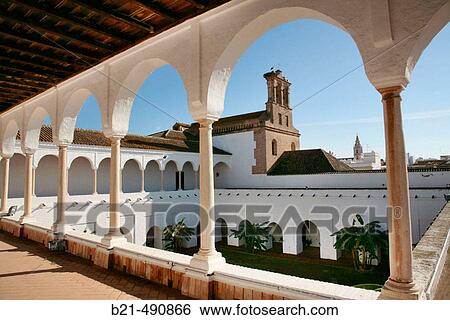 Stock Photograph - Upper Gallery of the? Patio de las Madres? (Mothers cloister) XV-XVIc., at the Monastery of Santa Clara, at Moguer. Huelva province. Spain.. Fotosearch