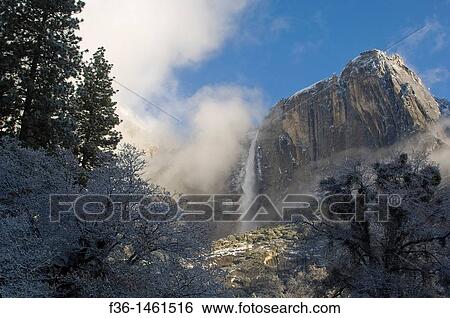 Upper Yosemite Fall waterfall after a spring snow storm, Yosemite National Park, California View Large Photo Image Stock Photograph - Upper Yosemite Fall waterfall after a spring snow storm, Yosemite National Park, California. Fotosearch