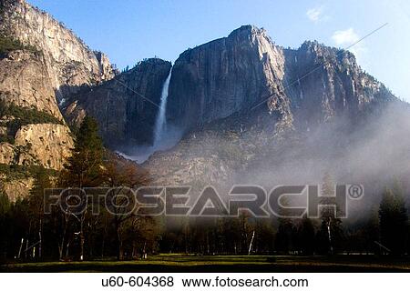 Upper Yosemite Falls as morning fog rises in Yosemite National Park, California. USA. View Large Photo Image Stock Photo - Upper Yosemite Falls as morning fog rises in Yosemite National Park, California. USA.. Fotosearch