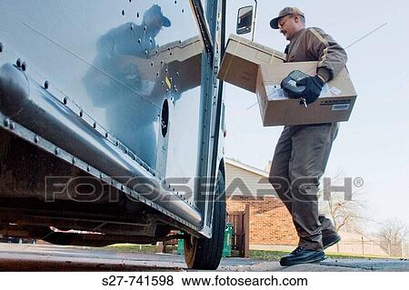 UPS delivery Driver Joe Wallace delivers packages. View Large Photo Image Stock Photo - UPS delivery Driver Joe Wallace delivers packages.. Fotosearch