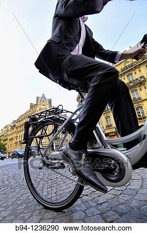 Stock Image - Urban cyclists, Paris, France. Fotosearch