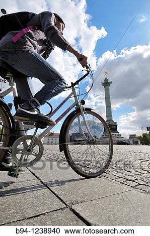 Urban cyclists, Place de la Bastille, Paris, France View Large Photo Image Stock Image - Urban cyclists, Place de la Bastille, Paris, France. Fotosearch