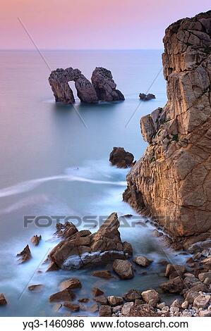 Stock Photograph - Urros de Liencres rocky isles, Costa Quebrada, Pi? lagos, Cantabria, Spain. Fotosearch