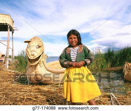 Uru indian girl and totora reeds boat. Titicaca Lake. Peru View Large Photo Image Stock Photo - Uru indian girl and totora reeds boat. Titicaca Lake. Peru. Fotosearch