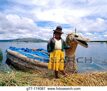 Uru indian woman and totora reeds boat. Titicaca Lake. Peru View Large Photo Image Stock Photo - Uru indian woman and totora reeds boat. Titicaca Lake. Peru. Fotosearch