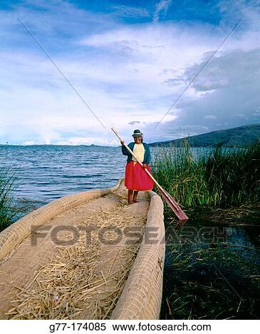 Uru indian woman and totora reeds boat. Titicaca Lake. Peru View Large Photo Image Stock Photography - Uru indian woman and totora reeds boat. Titicaca Lake. Peru. Fotosearch