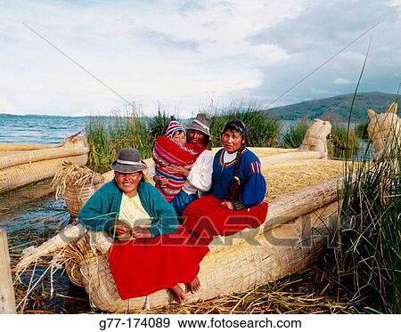 Uru indian women and totora reeds boat. Titicaca Lake. Peru View Large Photo Image Stock Photo - Uru indian women and totora reeds boat. Titicaca Lake. Peru. Fotosearch