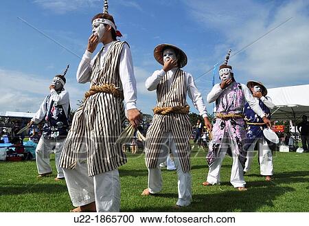 Stock Image - Uruma City, Okinawa, Japan, Eisa whistling-dances. Fotosearch