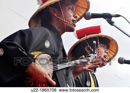 Uruma City, Okinawa, Japan, sanshin players during the Eisa festival View Large Photo Image Stock Photo - Uruma City, Okinawa, Japan, sanshin players during the Eisa festival. Fotosearch