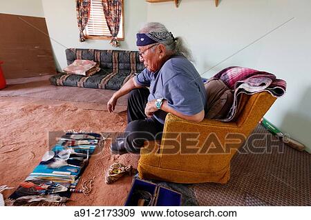 USA, Arizona, Navajo reservation, Monument Valley tribal park, Stanley Holiday, medicine man, 78 years, holds a blessing ceremony in his hogan View Large Photo Image Stock Photo - USA, Arizona, Navajo reservation, Monument Valley tribal park, Stanley Holiday, medicine man, 78 years, holds a blessing ceremony in his hogan. Fotosearch