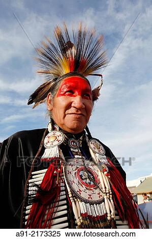 Stock Photography - USA, Arizona, Navajo reservation, Window Rock the capital during the annual september fair, the Pow Wow, drum music, songs and dances for the contestants dressed with their best regalia and feathers. Fotosearch