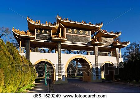 Stock Photo - USA, California, Northern California, North Coast, Ukiah, City of Ten Thousand Buddhas, Chinese-Buddhist Community, gate. Fotosearch