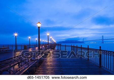 USA, California, San Francisco, Embarcadero, harbor view with Bay Bridge from Pier 7, Broadway Pier, dawn View Large Photo Image Stock Photography - USA, California, San Francisco, Embarcadero, harbor view with Bay Bridge from Pier 7, Broadway Pier, dawn. Fotosearch