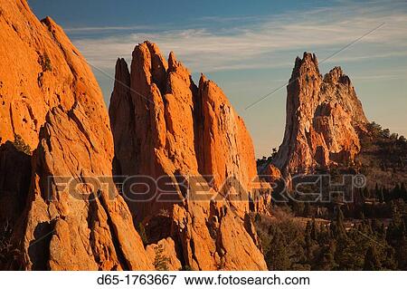 Stock Photo - USA, Colorado, Colorado Springs, Garden of the Gods, rock formations at sunset. Fotosearch