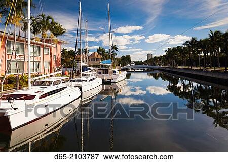 Stock Photo - USA, Florida, Fort Lauderdale, yachts along canal off Las Olas Boulevard.. Fotosearch