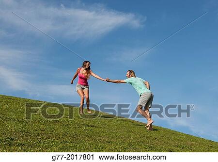 Usa. Florida. Miami Beach. Couple on a green meadow. View Large Photo Image Stock Image - Usa. Florida. Miami Beach. Couple on a green meadow.. Fotosearch